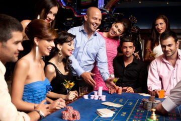 happy people at gambling table